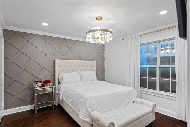 bedroom with ornamental molding and a decorative wall