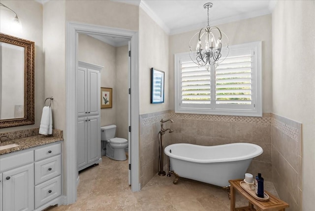 8230 County Road 530, Mansfield, TX 76063 - bathroom with a freestanding bath, tile walls, vanity, and a notable chandelier