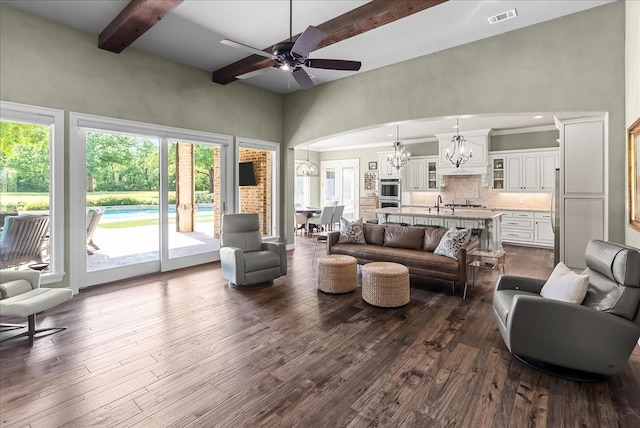 8230 County Road 530, Mansfield, TX 76063 - living room with visible vents, a high ceiling, dark wood-type flooring, and beam ceiling