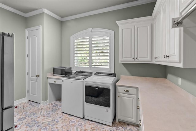 8230 County Road 530, Mansfield, TX 76063 - clothes washing area with washing machine and clothes dryer, baseboards, ornamental molding, and cabinet space