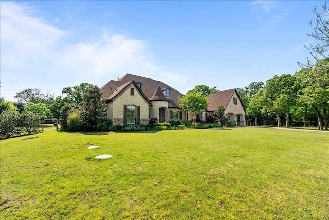 8230 County Road 530, Mansfield, TX 76063 - french country inspired facade featuring a front yard and stone siding