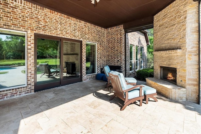 8230 County Road 530, Mansfield, TX 76063 - view of patio / terrace with an outdoor stone fireplace