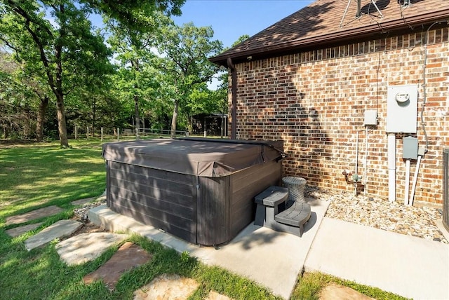 8230 County Road 530, Mansfield, TX 76063 - details featuring brick siding, a jacuzzi, and electric meter