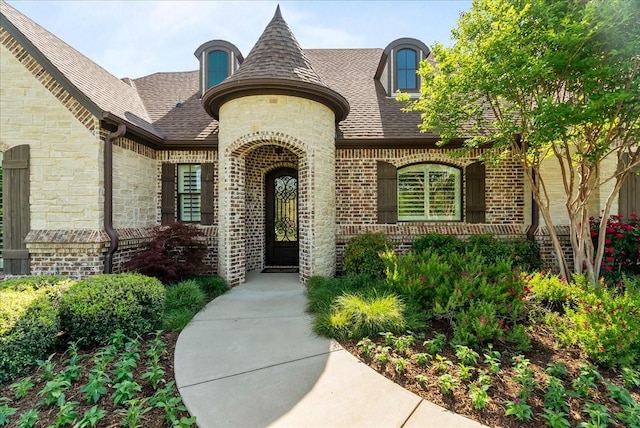 8230 County Road 530, Mansfield, TX 76063 - property entrance with a shingled roof, brick siding, and stone siding