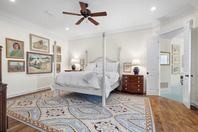 bedroom featuring crown molding, recessed lighting, visible vents, and wood finished floors