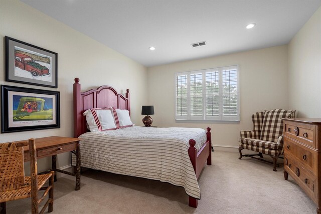 bedroom featuring visible vents, recessed lighting, baseboards, and light carpet