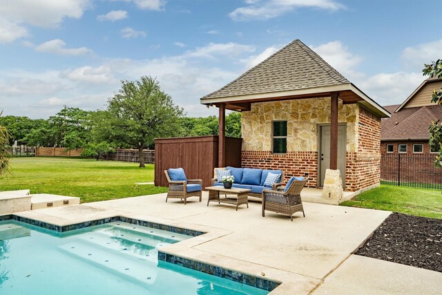 view of swimming pool with an outdoor living space, a patio area, a fenced in pool, a fenced backyard, and a yard