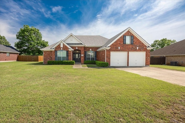 265 Old Spanish Trl, Valley View, TX 76272 - view of front facade featuring brick siding, central AC, fence, and a garage