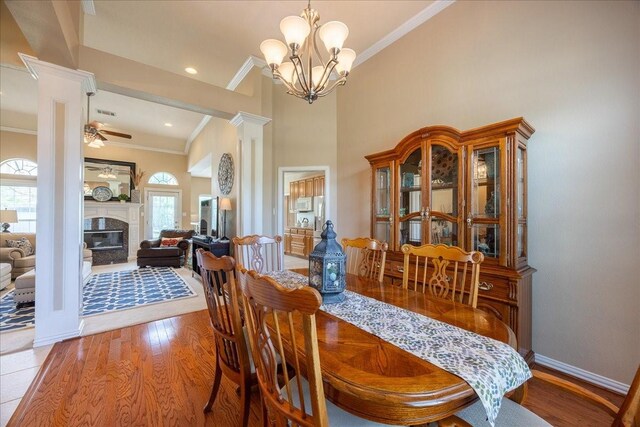265 Old Spanish Trl, Valley View, TX 76272 - dining room featuring ornamental molding, decorative columns, and wood finished floors