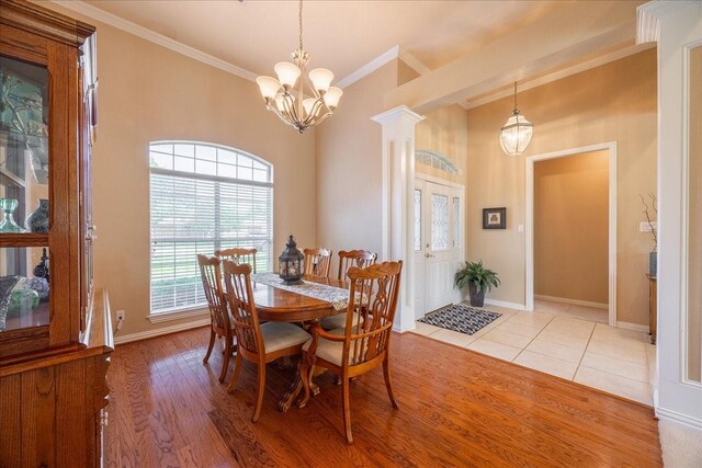 265 Old Spanish Trl, Valley View, TX 76272 - dining room with an inviting chandelier, ornamental molding, baseboards, and light wood-type flooring