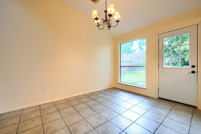 9104 Chesapeake Ln, Mckinney, TX 75071 - unfurnished dining area with a chandelier, lofted ceiling, light tile patterned flooring, and baseboards