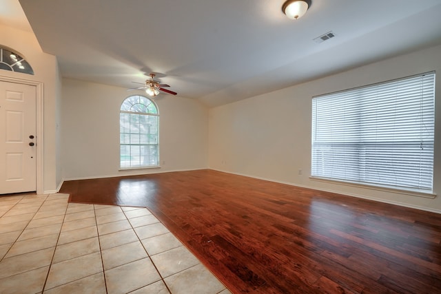9104 Chesapeake Ln, Mckinney, TX 75071 - entryway with lofted ceiling, a ceiling fan, wood finished floors, and baseboards