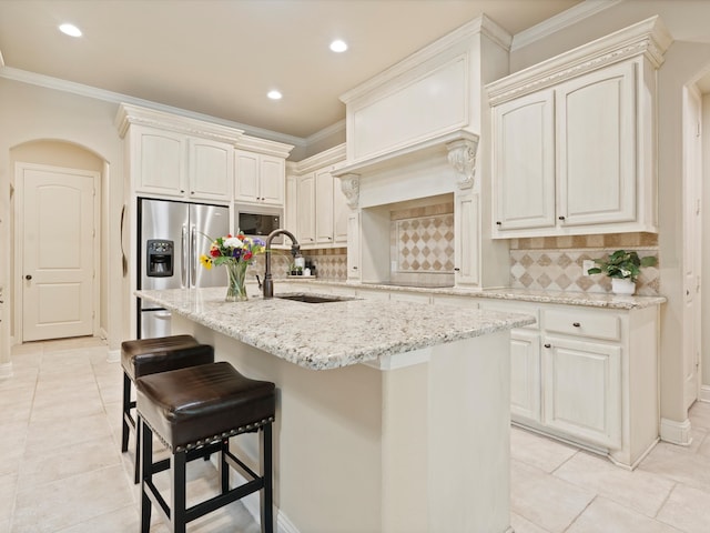 10 Tennis Village Dr, Heath, TX 75032 - kitchen with stainless steel fridge, light tile patterned floors, a sink, recessed lighting, and ornamental molding