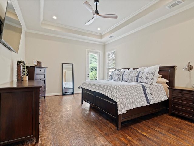 10 Tennis Village Dr, Heath, TX 75032 - bedroom featuring wood finished floors, a tray ceiling, crown molding, ceiling fan, and baseboards