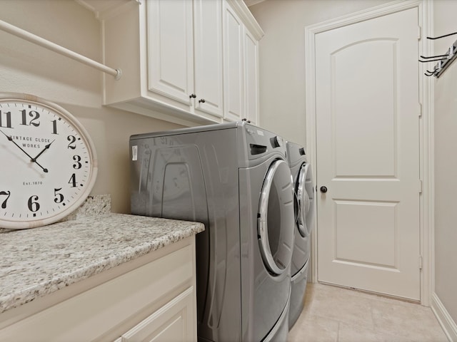 10 Tennis Village Dr, Heath, TX 75032 - laundry room featuring cabinet space, washer and dryer, and light tile patterned flooring