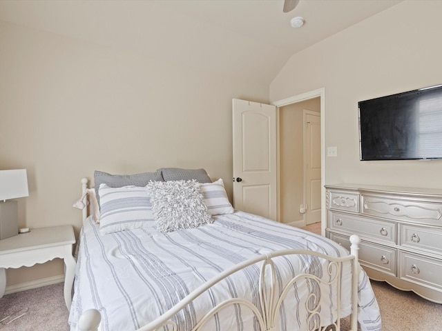 10 Tennis Village Dr, Heath, TX 75032 - bedroom with light carpet, lofted ceiling, and baseboards