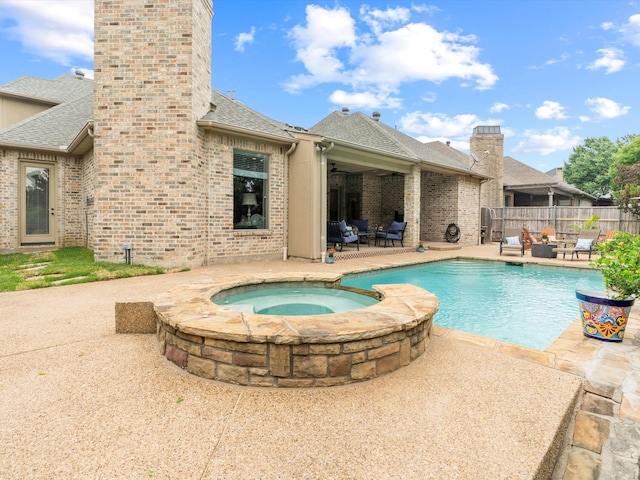 10 Tennis Village Dr, Heath, TX 75032 - view of pool featuring a patio and a pool with connected hot tub
