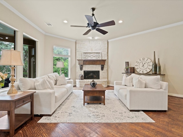 10 Tennis Village Dr, Heath, TX 75032 - living area featuring crown molding, a ceiling fan, wood finished floors, recessed lighting, and a fireplace