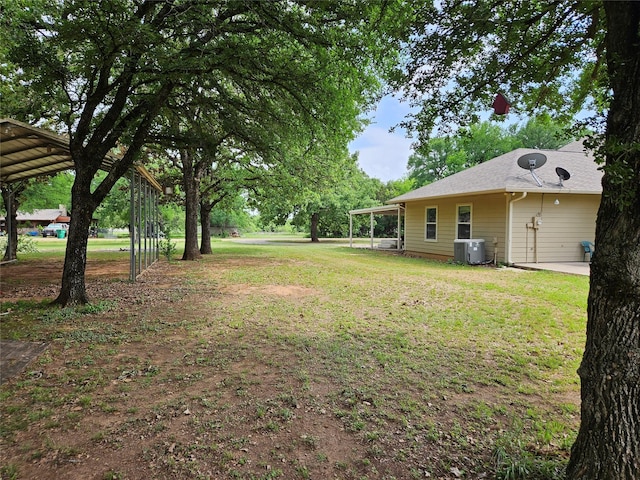 122 S Greenbriar Rd, Whitney, TX 76692 - view of green lawn featuring central air condition unit