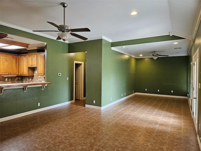 unfurnished living room featuring baseboards, ornamental molding, a ceiling fan, and recessed lighting