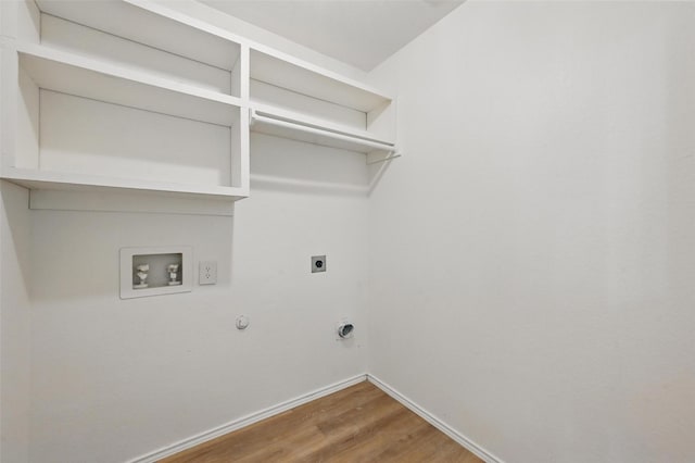 washroom with laundry area, wood finished floors, baseboards, hookup for a washing machine, and hookup for an electric dryer