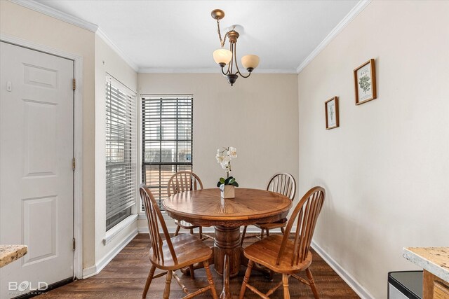 284 Settlers Park Dr, Shreveport, LA 71115 - dining space with crown molding, a notable chandelier, baseboards, and dark wood finished floors