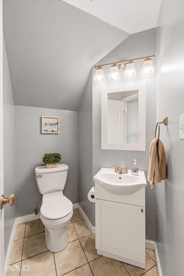 284 Settlers Park Dr, Shreveport, LA 71115 - bathroom with toilet, tile patterned flooring, lofted ceiling, and vanity