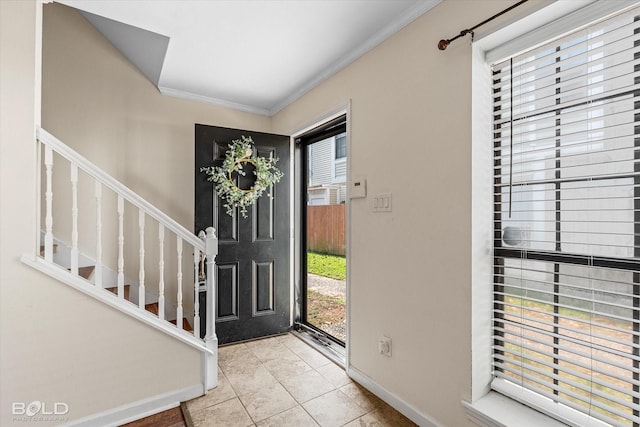 284 Settlers Park Dr, Shreveport, LA 71115 - foyer entrance featuring light tile patterned flooring, baseboards, ornamental molding, and stairway