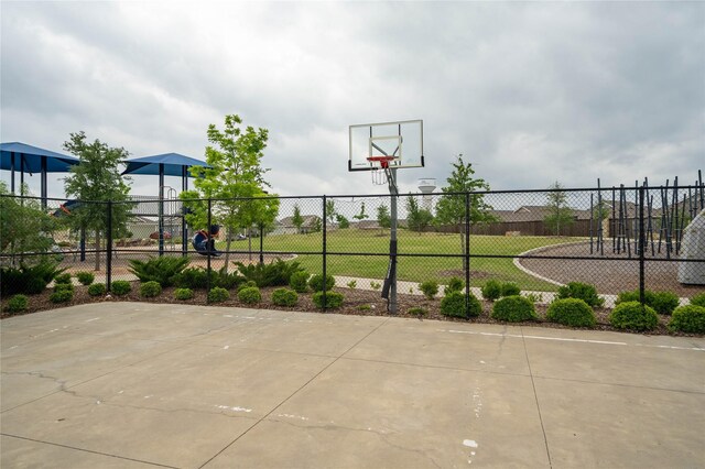 view of sport court with fence and community basketball court