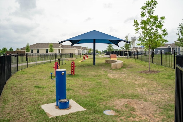 surrounding community featuring a yard and fence