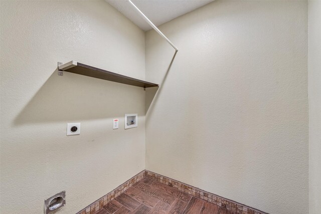 laundry area featuring baseboards, hookup for an electric dryer, laundry area, and hookup for a washing machine