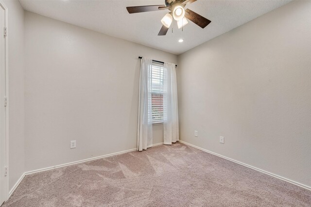 spare room with carpet floors, ceiling fan, baseboards, and recessed lighting