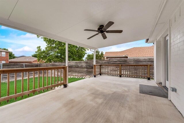 view of patio featuring ceiling fan and a fenced backyard