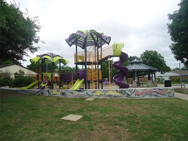 community playground with a yard and a gazebo