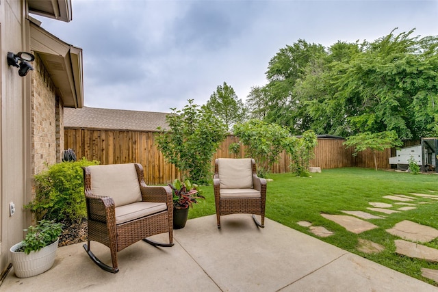view of patio featuring a fenced backyard