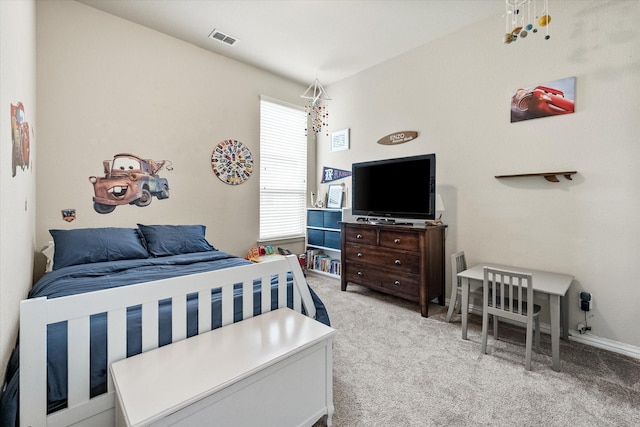 bedroom featuring light colored carpet and visible vents