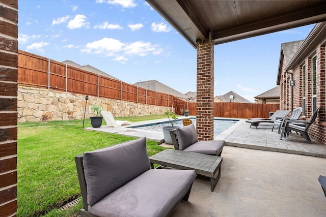 view of patio featuring a fenced in pool and a fenced backyard