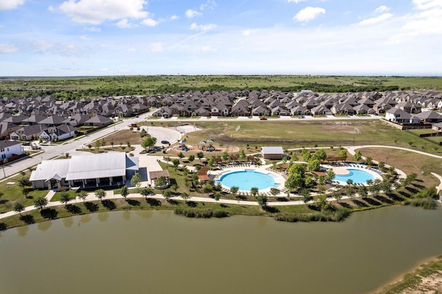 15036 Amber Sky Dr, Aledo, TX 76008 - aerial view of property and surrounding area featuring nearby suburban area, a pool area, and a large body of water
