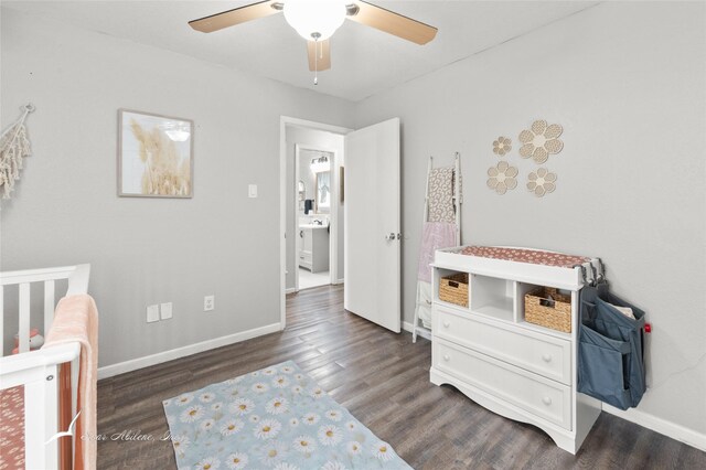 bedroom with baseboards, a ceiling fan, and dark wood-style flooring