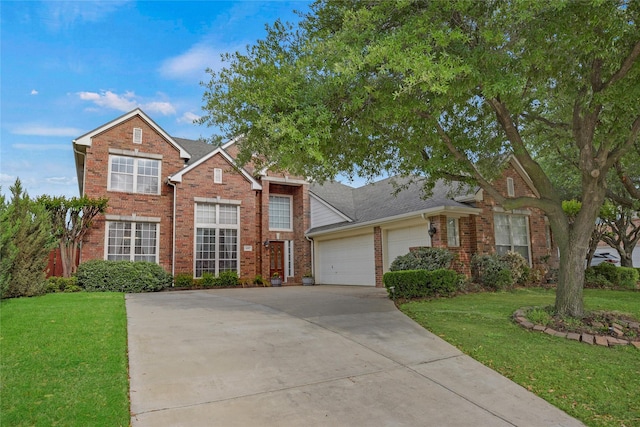 traditional home featuring concrete driveway, brick siding, a front lawn, and a garage