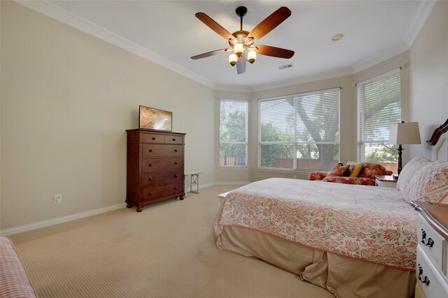 bedroom featuring a ceiling fan, light colored carpet, crown molding, visible vents, and baseboards