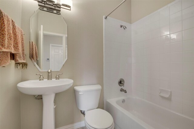 full bathroom featuring toilet and tub / shower combination
