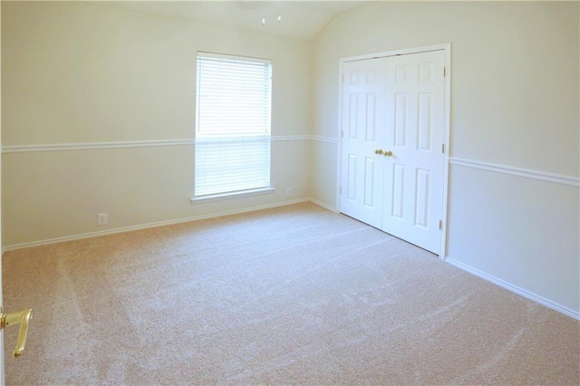 10408 Ambergate Ln, Frisco, TX 75035 - unfurnished bedroom with baseboards, vaulted ceiling, and carpet