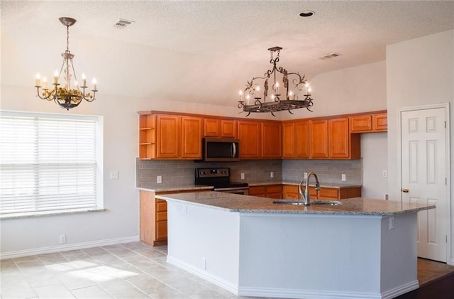 10408 Ambergate Ln, Frisco, TX 75035 - kitchen with an inviting chandelier, decorative backsplash, vaulted ceiling, and stainless steel appliances