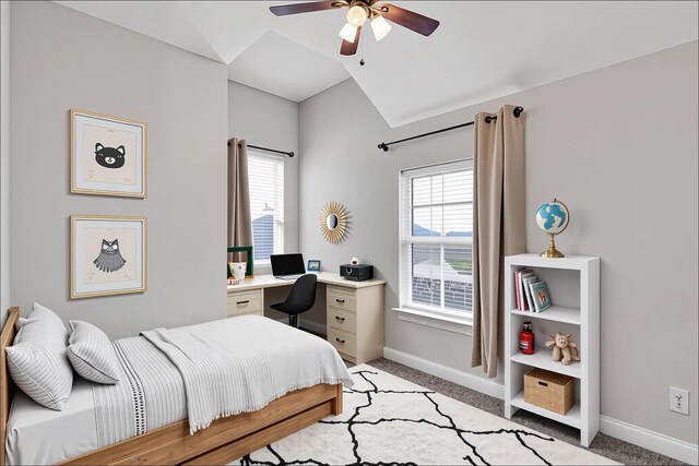 bedroom featuring a ceiling fan, baseboards, light colored carpet, and vaulted ceiling