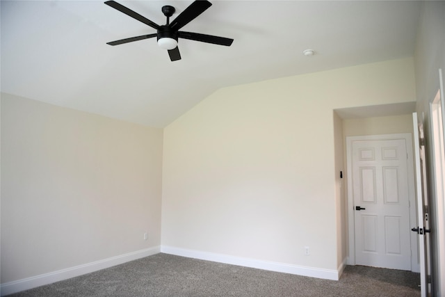 148 E Marguerita Dr, Garland, TX 75040 - unfurnished room featuring dark carpet, baseboards, and lofted ceiling