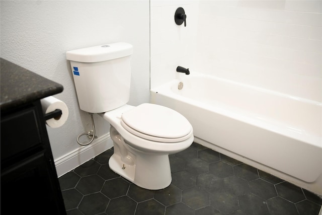 148 E Marguerita Dr, Garland, TX 75040 - bathroom with wood finished floors, toilet, and baseboards