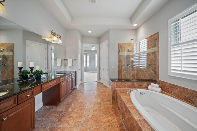 bathroom featuring double vanity, recessed lighting, a garden tub, and a stall shower