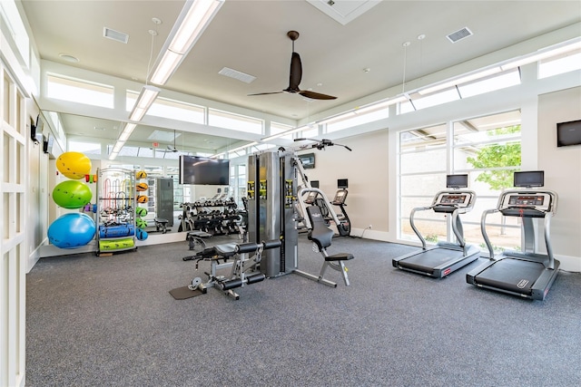 workout area with ceiling fan and visible vents