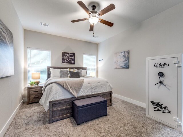 bedroom featuring visible vents, baseboards, carpet floors, and multiple windows